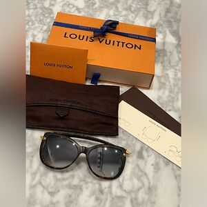 Louis Vuitton Sunglasses- tortoise design folds two ways